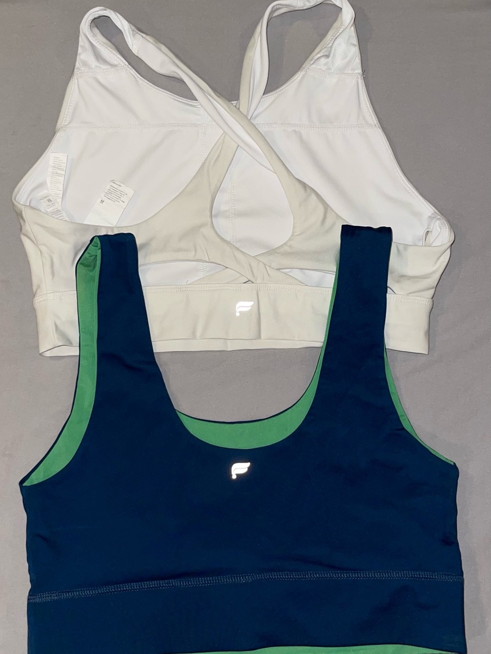 Fabletics Women’s White and Navy Sports Bras with Green Trim